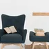 Elegantní prošívaná podnožka s dřevěnými nohami do obývacího pokoje Karro